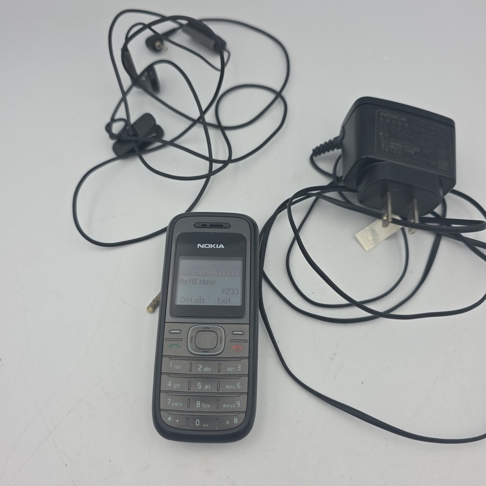 Nokia Cell Phone Model 1208 T-Mobile With Charger And Ear Buds